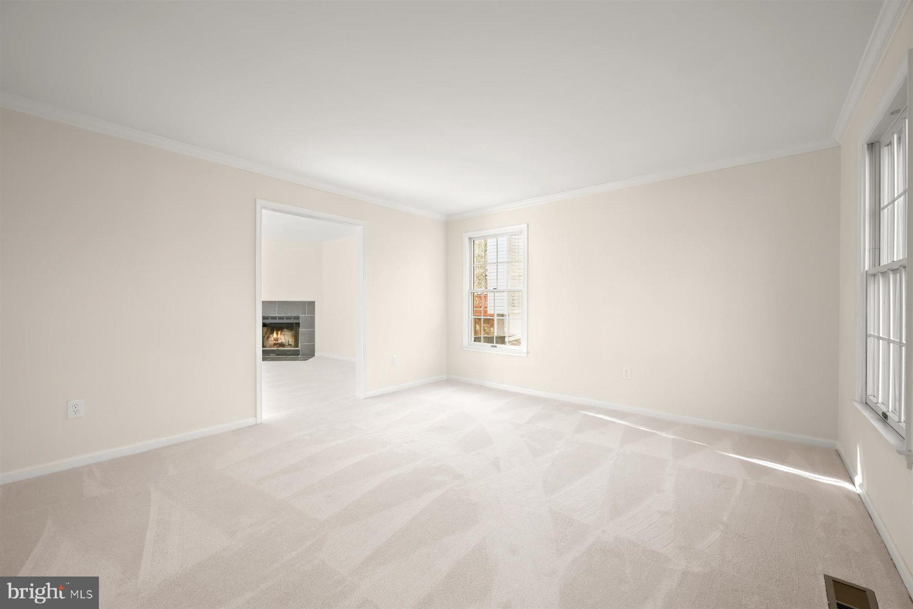 13121 Old Fletchertown Road Bowie, MD 20720 - Photo 8 of 91 a view of an empty room with a window