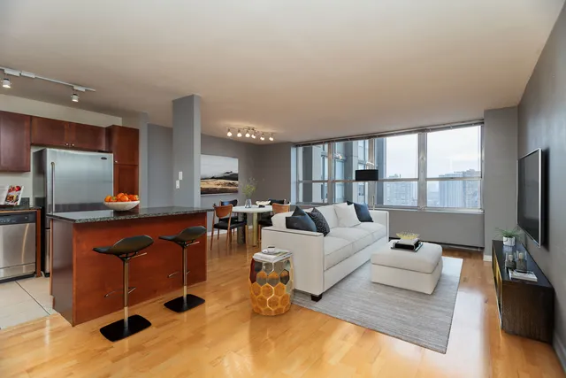 a living room with couch and a table