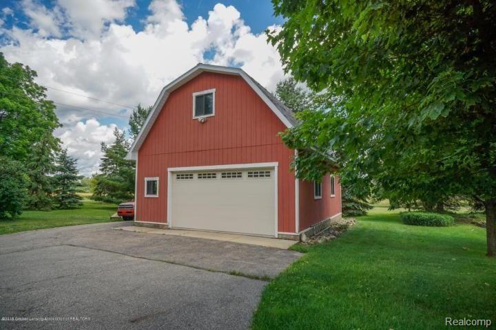 5301 Sherwood Road Webberville, MI 48892 - Photo 6 of 30 Loft storage in the large 2 car barn style garage!