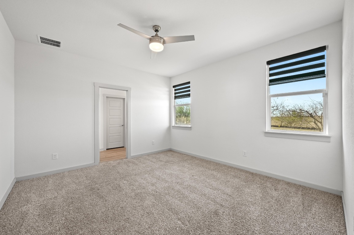 407 Wilshire Road San Marcos, TX 78666 - Photo 15 of 25 an empty room with windows