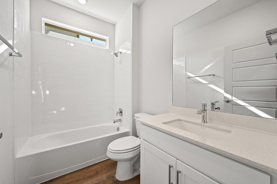 407 Wilshire Road San Marcos, TX 78666 - Photo 20 of 25 a bathroom with a sink a toilet and shower