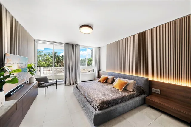 a bathroom with a double vanity sink mirror double and shower