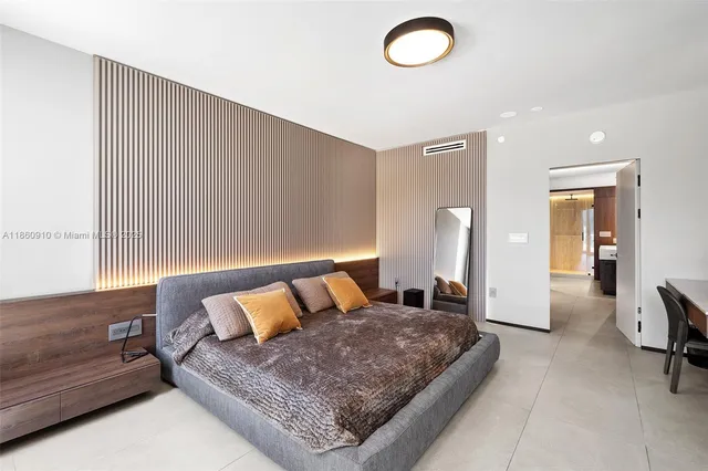 a spacious bathroom with a bathtub and a shower