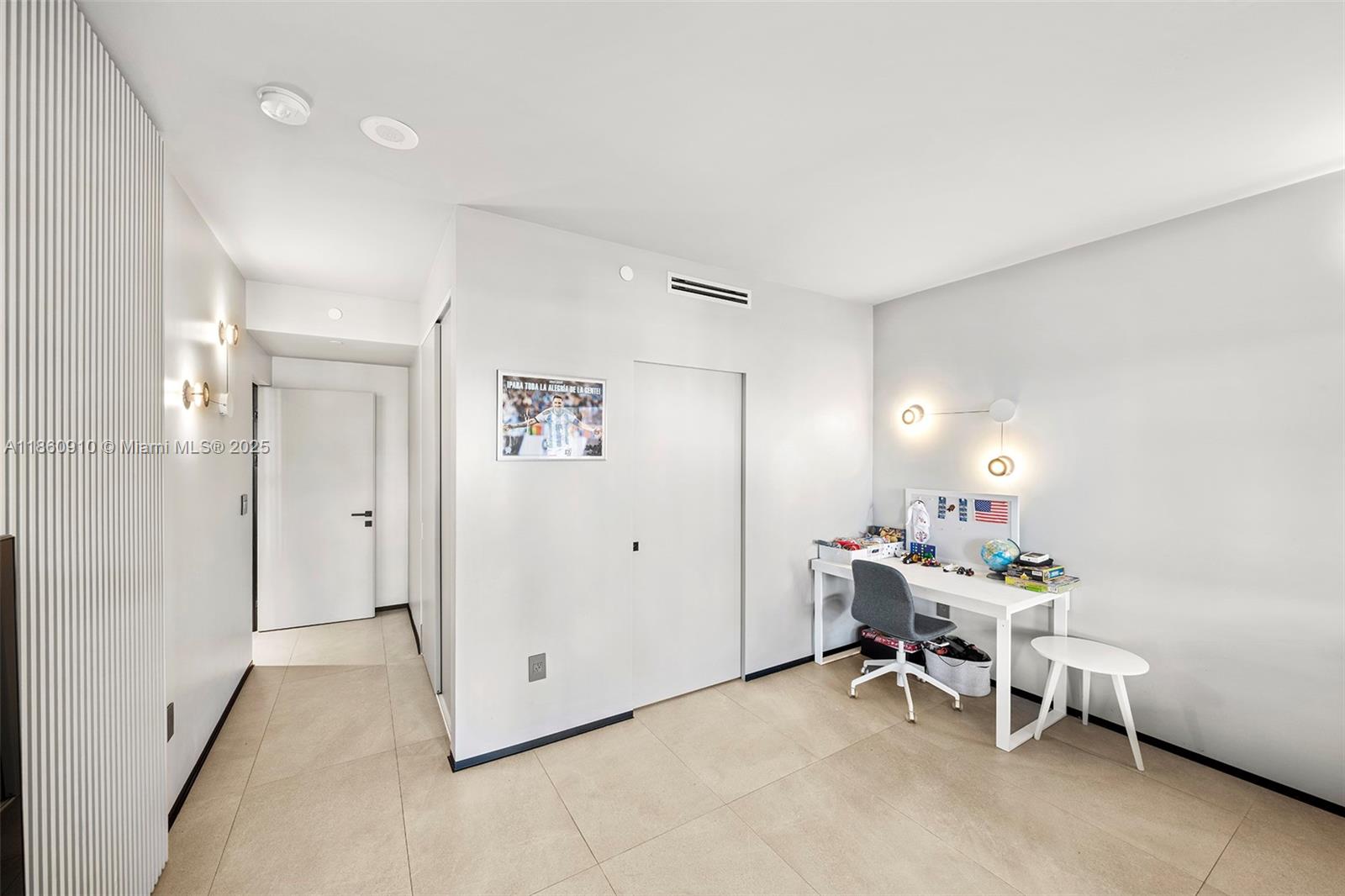 785 Crandon Boulevard, Unit 303 Key Biscayne, FL 33149 - Photo 33 of 57 a room with furniture and a window