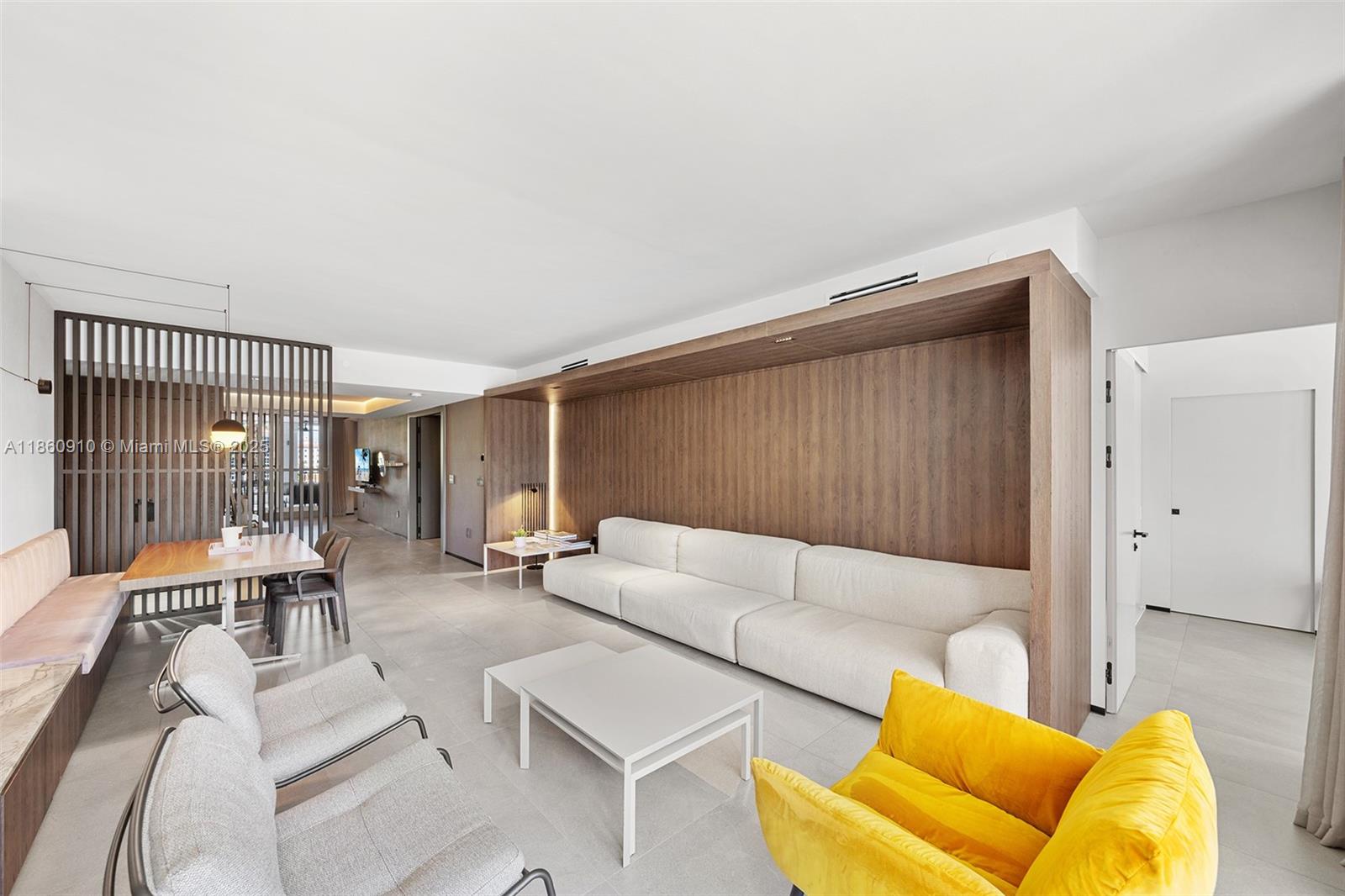 785 Crandon Boulevard, Unit 303 Key Biscayne, FL 33149 - Photo 4 of 57 a living room with furniture and a wooden floor