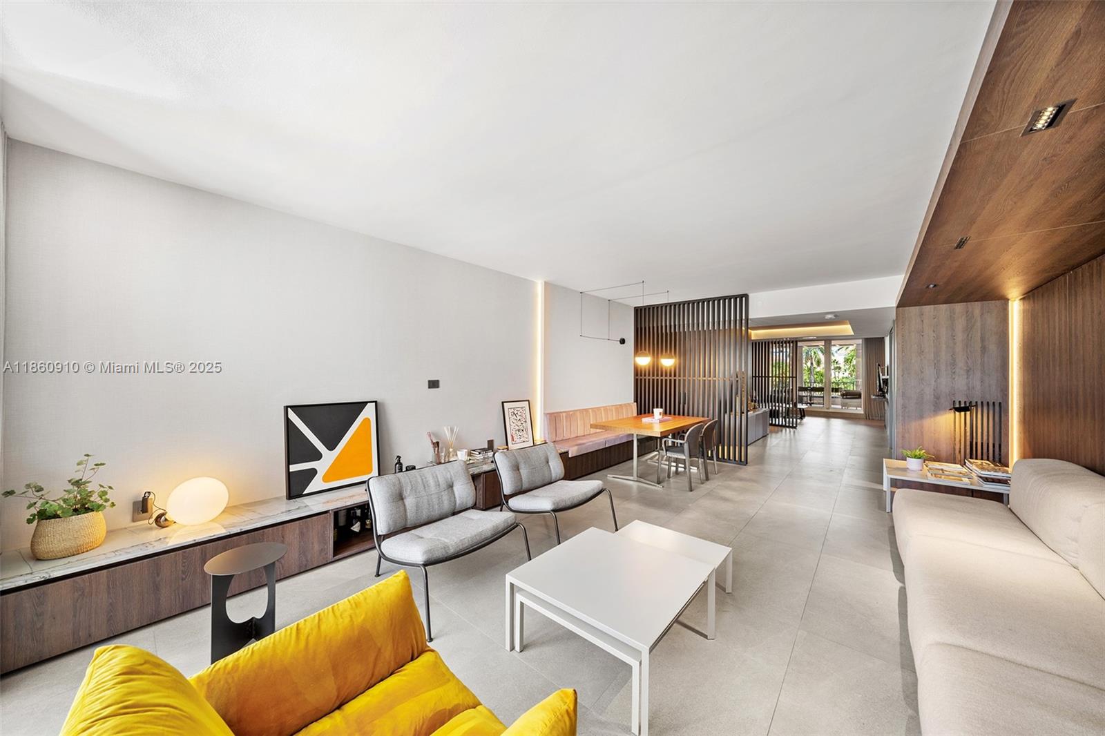 785 Crandon Boulevard, Unit 303 Key Biscayne, FL 33149 - Photo 6 of 57 a living room with furniture and wooden floor