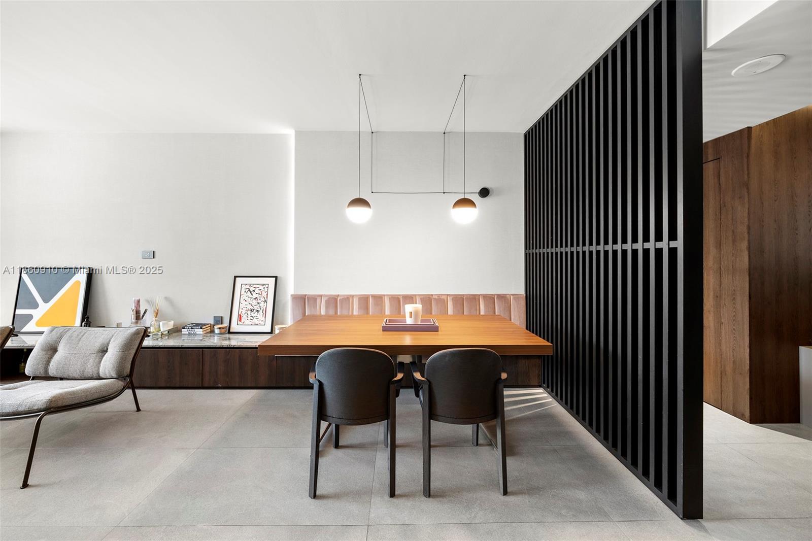 785 Crandon Boulevard, Unit 303 Key Biscayne, FL 33149 - Photo 9 of 57 a view of a livingroom with furniture and window