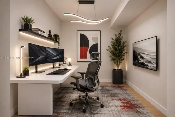 a workspace with furniture and mirror