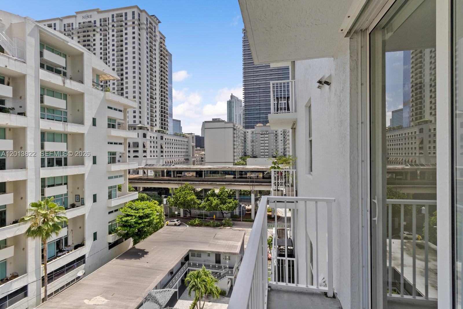 115 Southwest 11th Street, Unit 707 Miami, FL 33130 - Photo 12 of 25 a city view with tall buildings