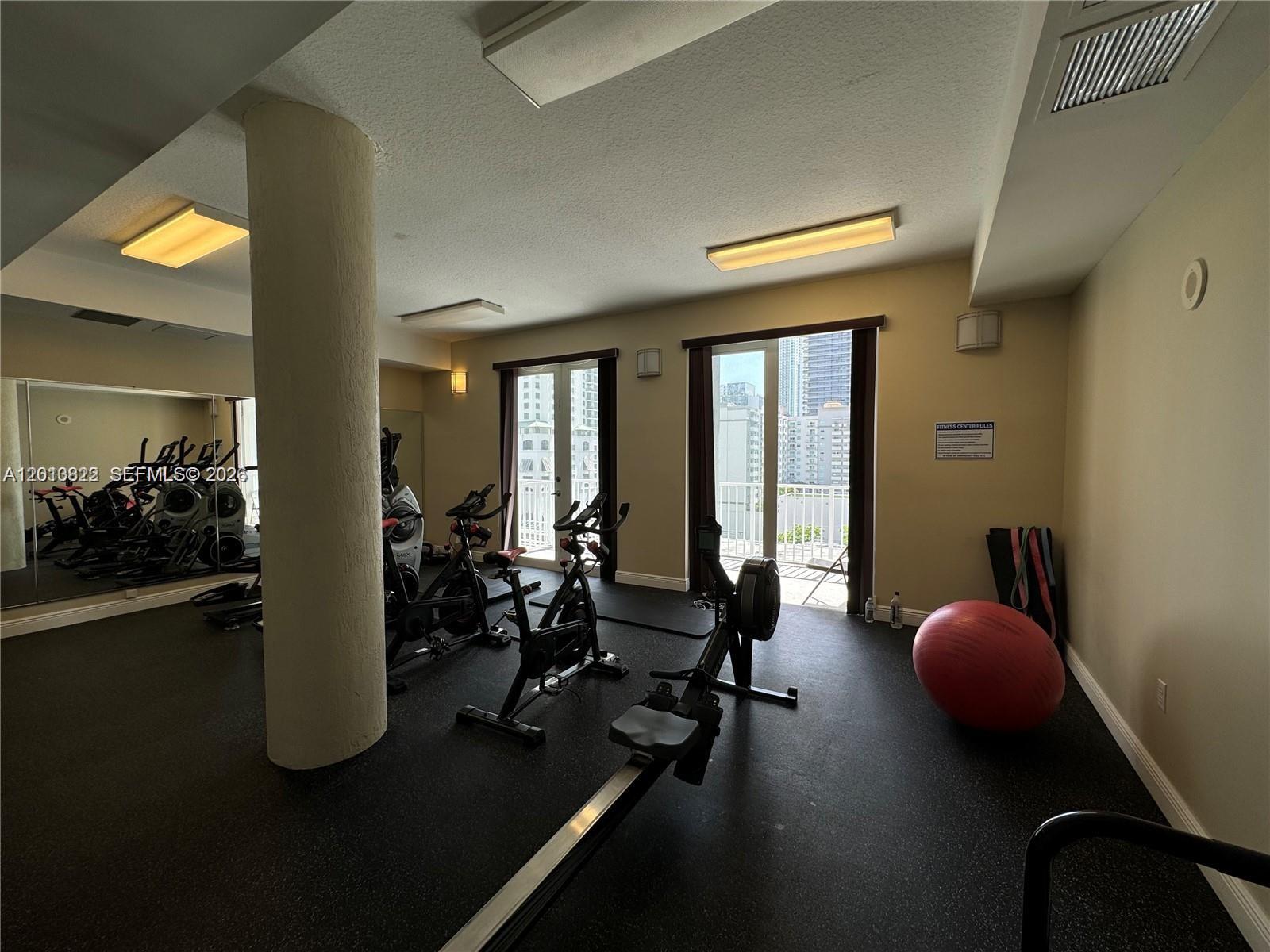 115 Southwest 11th Street, Unit 707 Miami, FL 33130 - Photo 14 of 25 a room with furniture