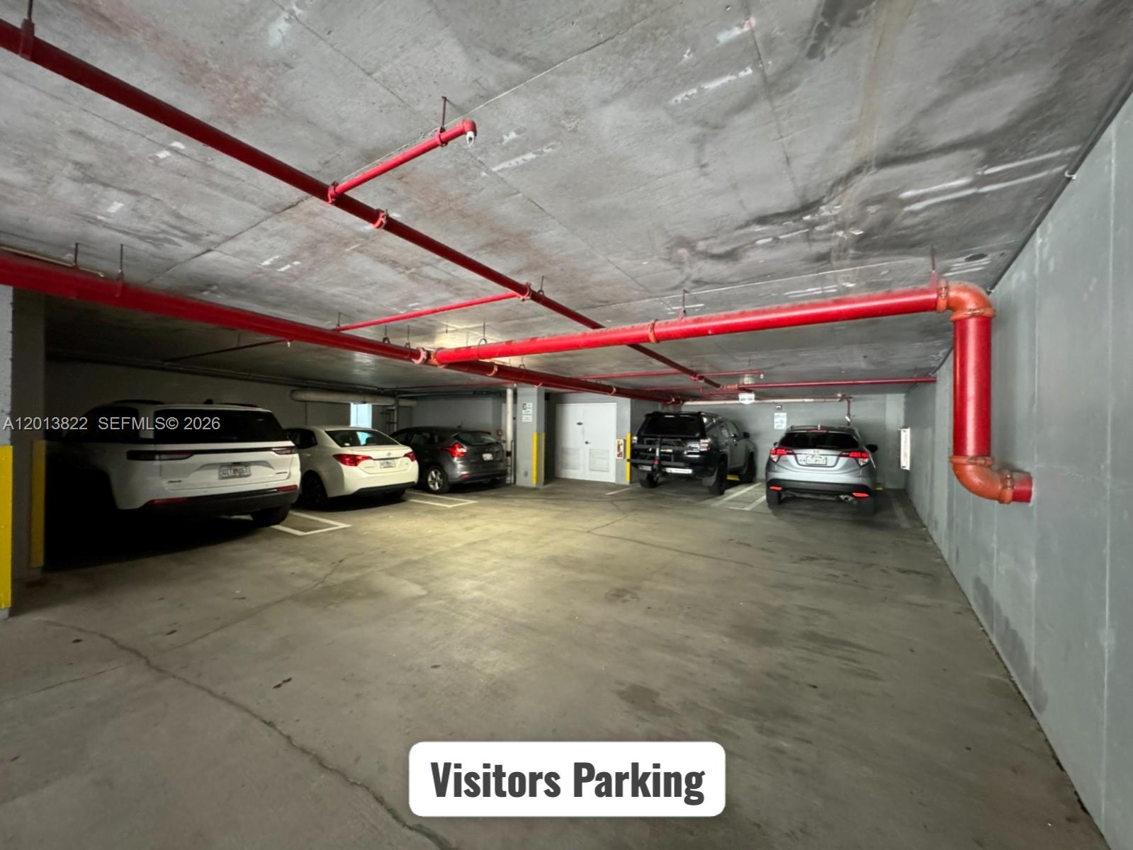 115 Southwest 11th Street, Unit 707 Miami, FL 33130 - Photo 17 of 25 a view of a parking area