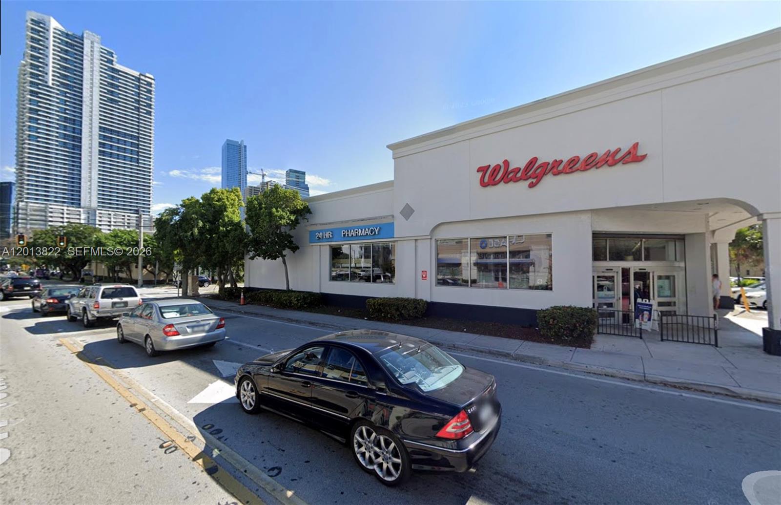 115 Southwest 11th Street, Unit 707 Miami, FL 33130 - Photo 25 of 25 a car parked in front of a building