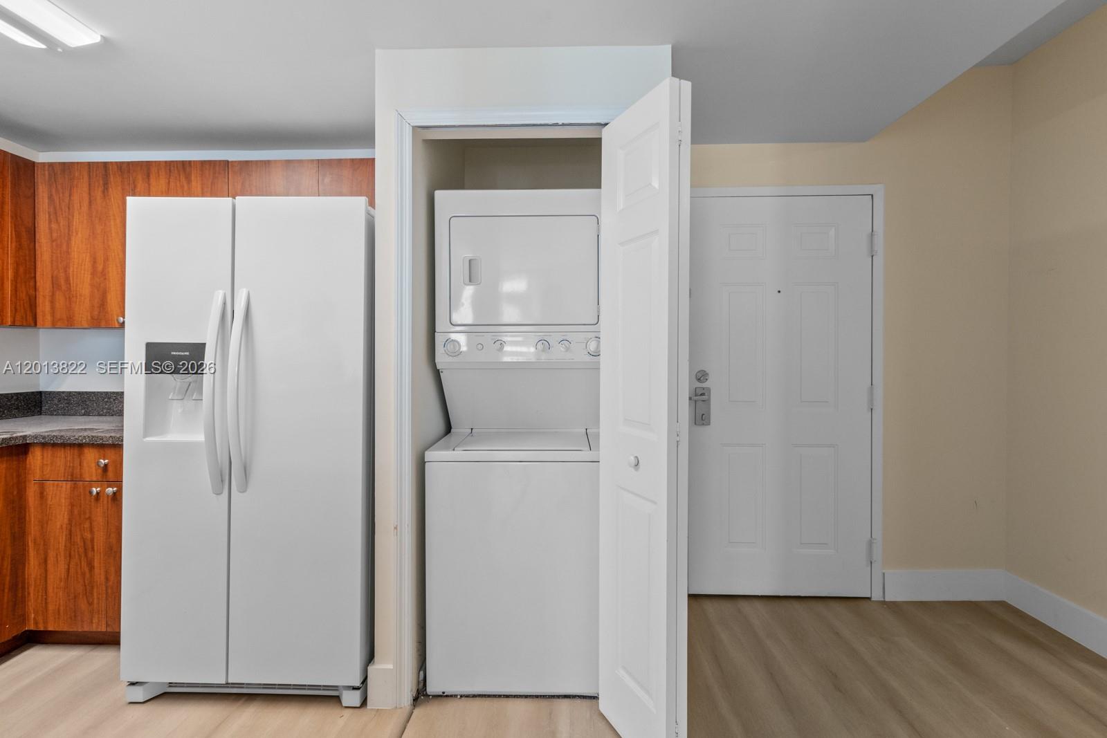 115 Southwest 11th Street, Unit 707 Miami, FL 33130 - Photo 7 of 25 a view of walk in closet with empty racks