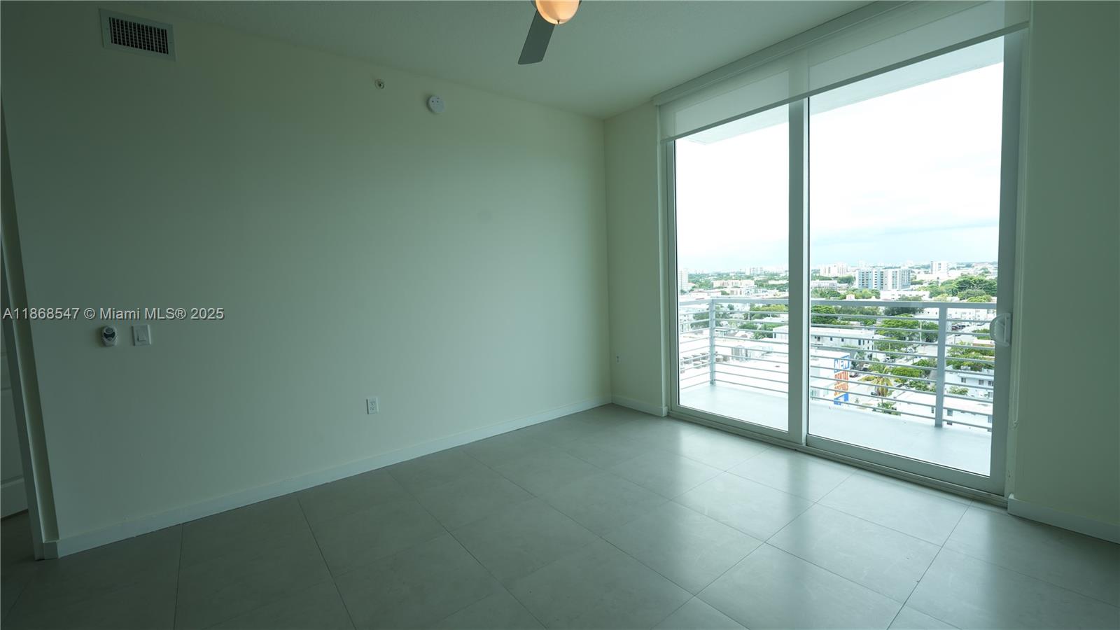 729 Northwest 2nd Street, Unit 717 Miami, FL 33128 - Photo 15 of 25 a view of room with window