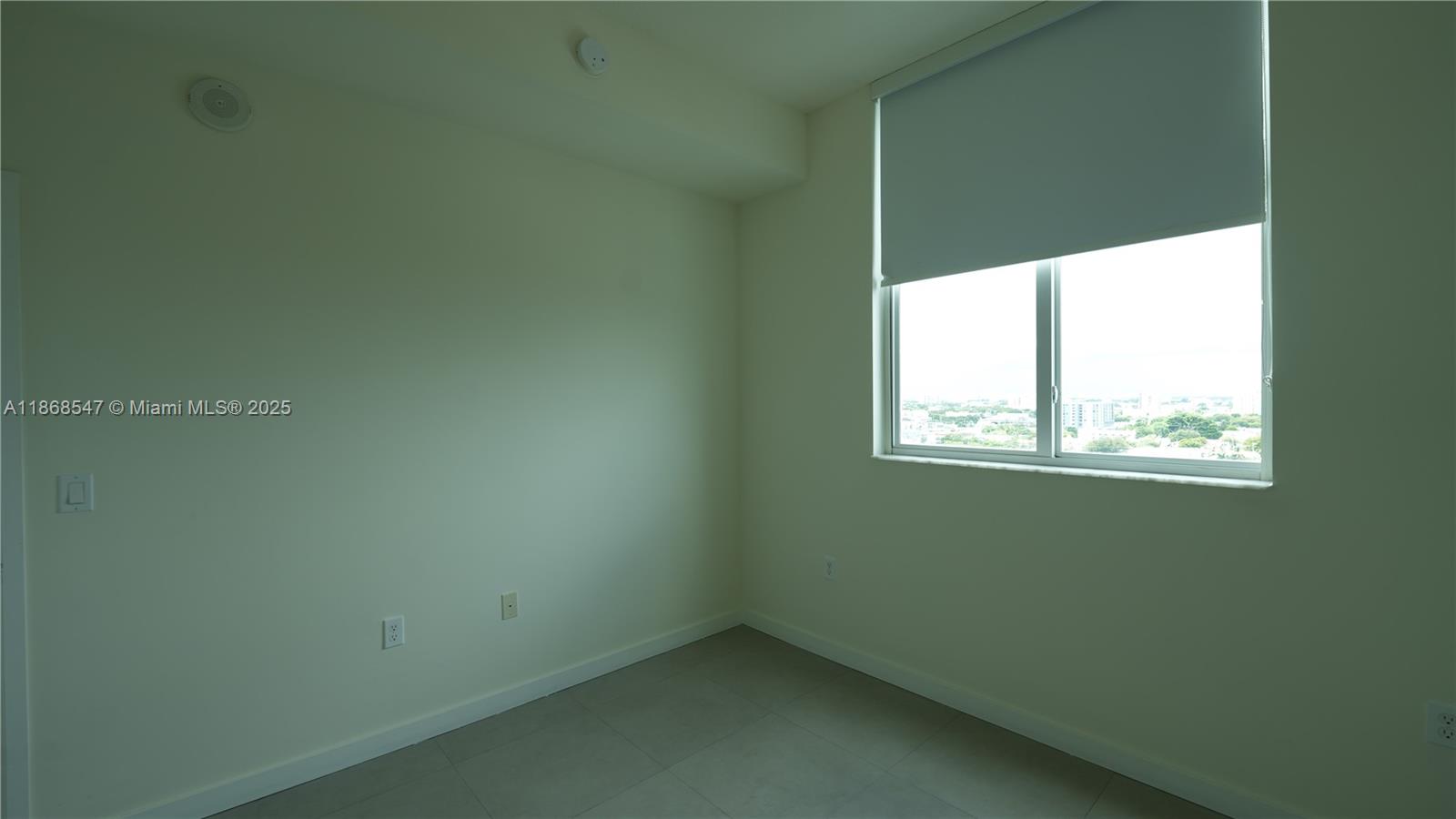729 Northwest 2nd Street, Unit 717 Miami, FL 33128 - Photo 17 of 25 a small space with a window