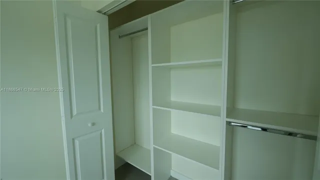 a room with walk in closet