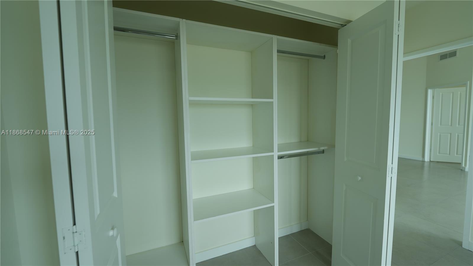 729 Northwest 2nd Street, Unit 717 Miami, FL 33128 - Photo 20 of 25 a room with walk in closet
