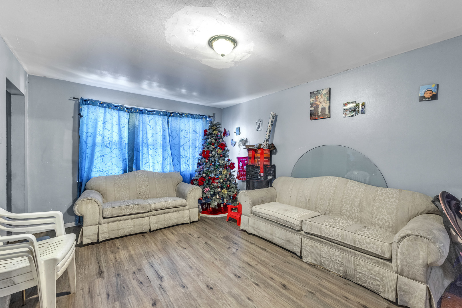 5114 South Justine Street Chicago, IL 60609 - Photo 12 of 37 a living room with furniture and a couch