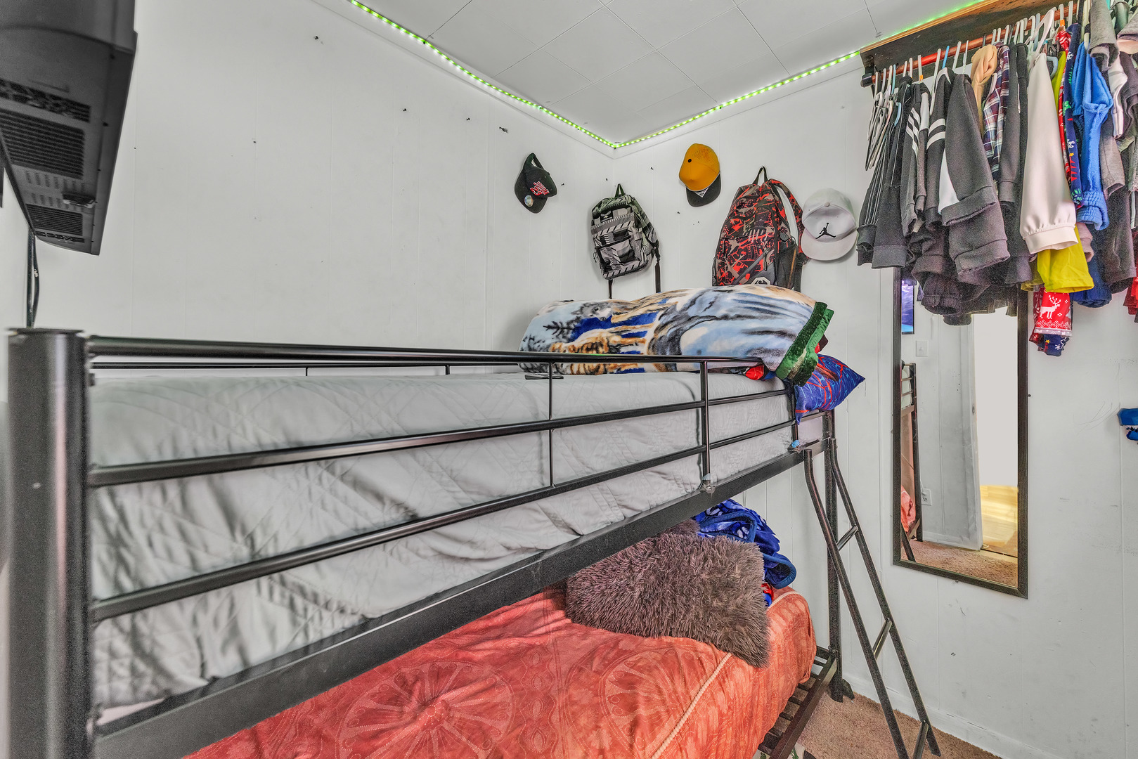 5114 South Justine Street Chicago, IL 60609 - Photo 14 of 37 a bedroom with bed and a window