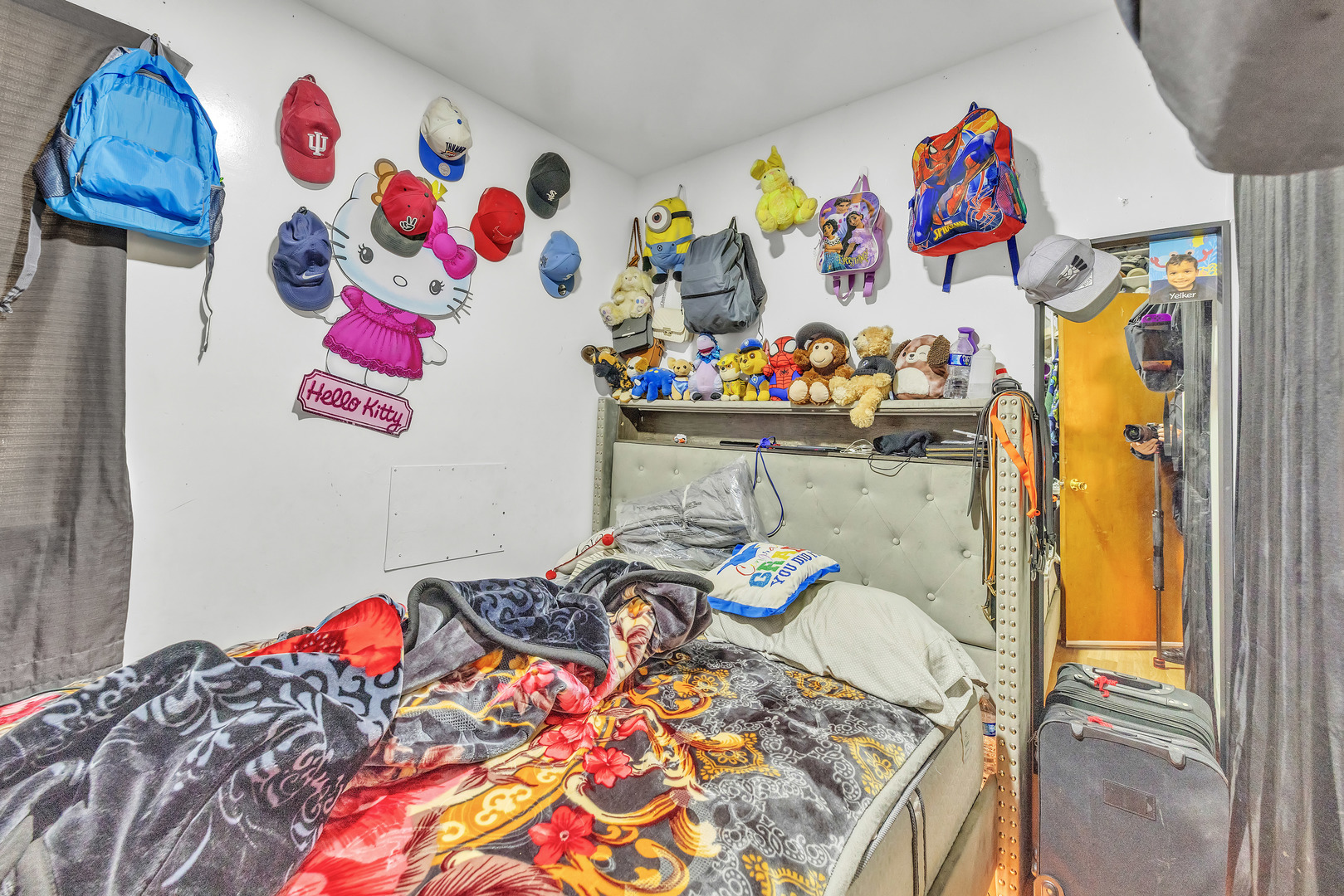 5114 South Justine Street Chicago, IL 60609 - Photo 17 of 37 a bed room with a bed and a couch