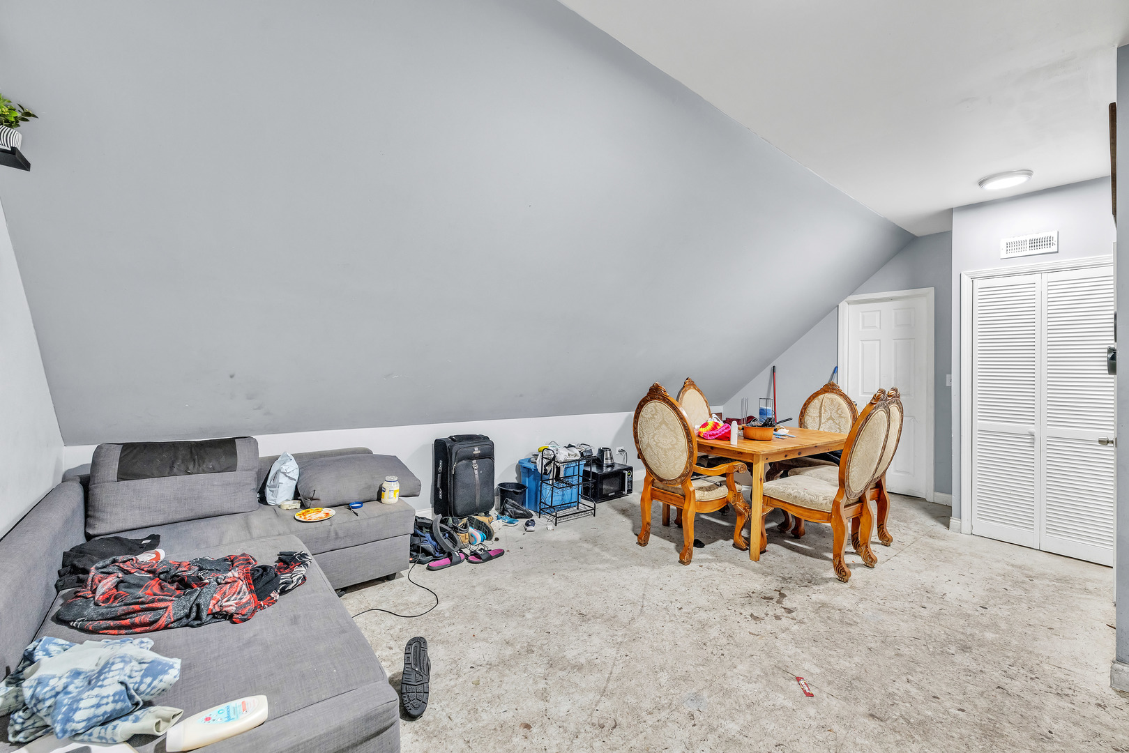 5114 South Justine Street Chicago, IL 60609 - Photo 22 of 37 a living room with furniture and a table