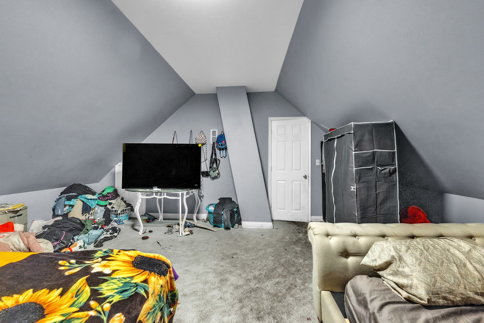 5114 South Justine Street Chicago, IL 60609 - Photo 26 of 37 a living room with furniture and a flat screen tv