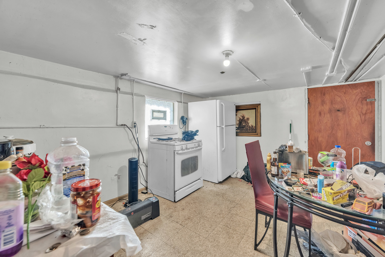 5114 South Justine Street Chicago, IL 60609 - Photo 30 of 37 a room with storage and utility