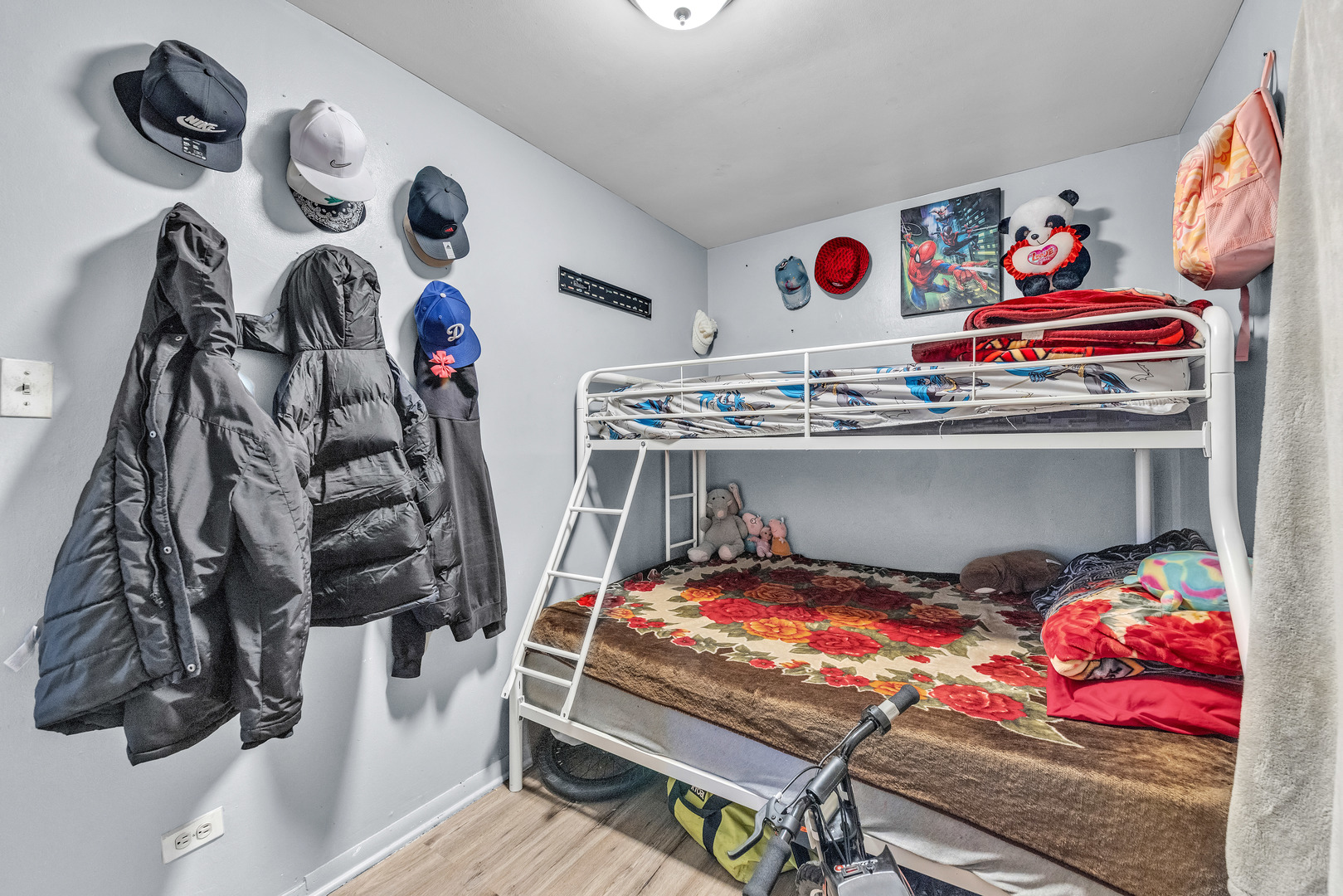 5114 South Justine Street Chicago, IL 60609 - Photo 5 of 37 a view of walk in closet with clothes and shoes