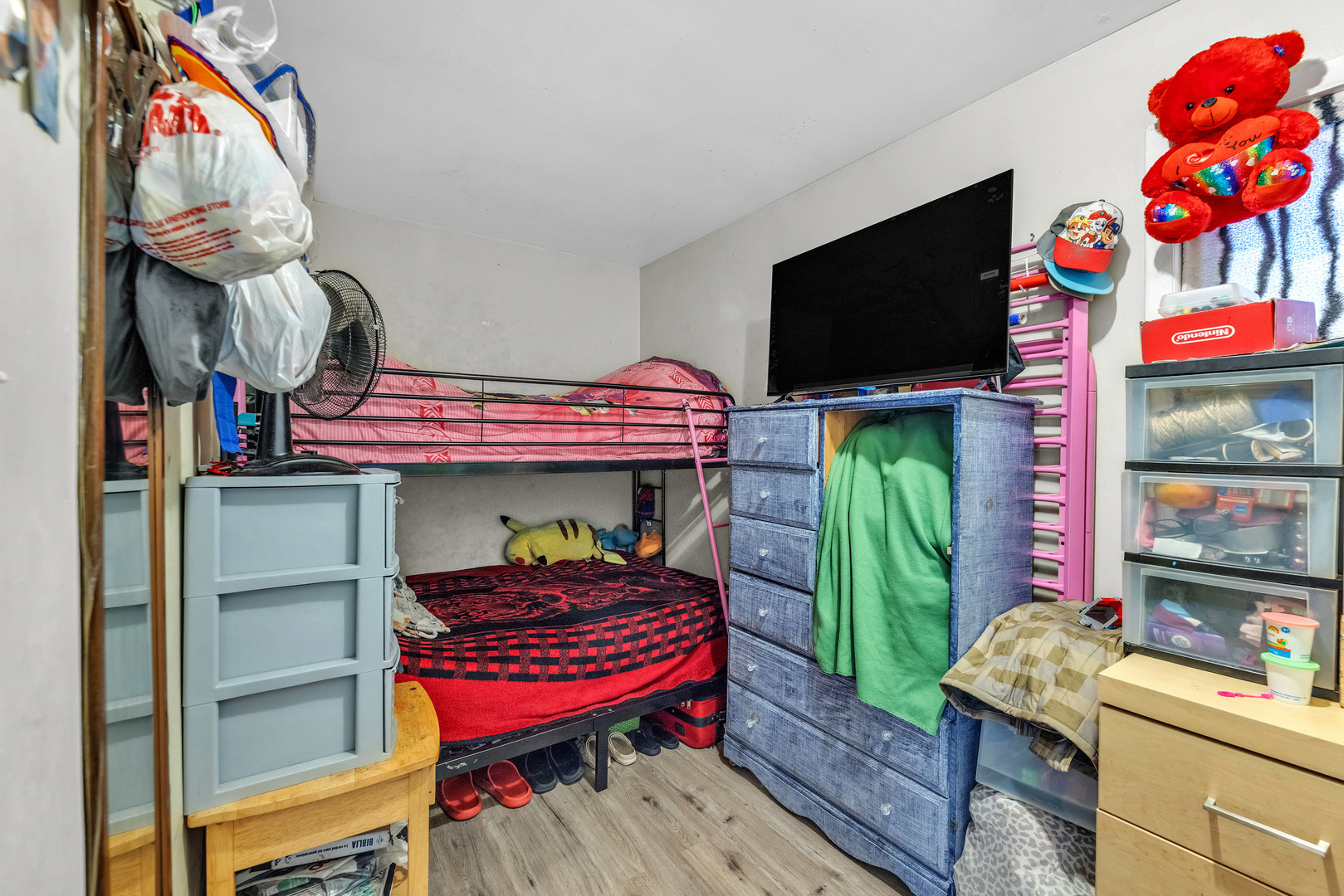 5114 South Justine Street Chicago, IL 60609 - Photo 6 of 37 a outdoor living space with furniture and a flat screen tv