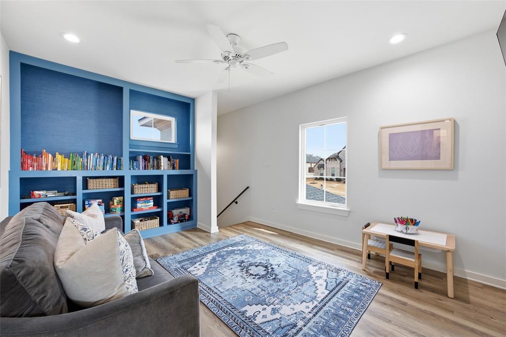 17001 Escondida Court Woodway, TX 76712 - Photo 24 of 40 a living room with furniture and a rug