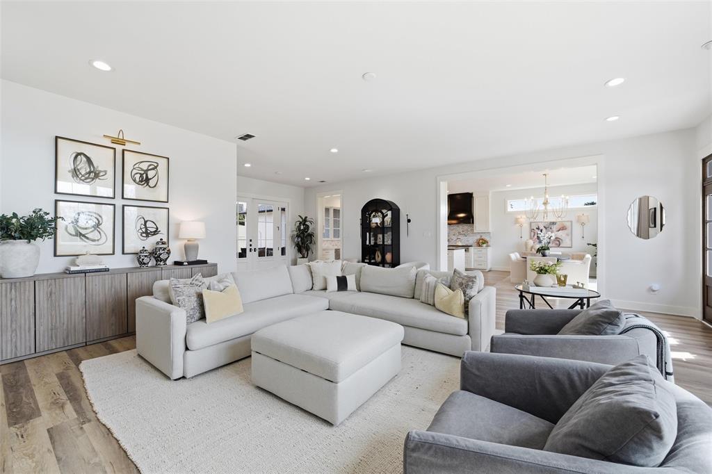 17001 Escondida Court Woodway, TX 76712 - Photo 4 of 40 a living room with furniture and wooden floor