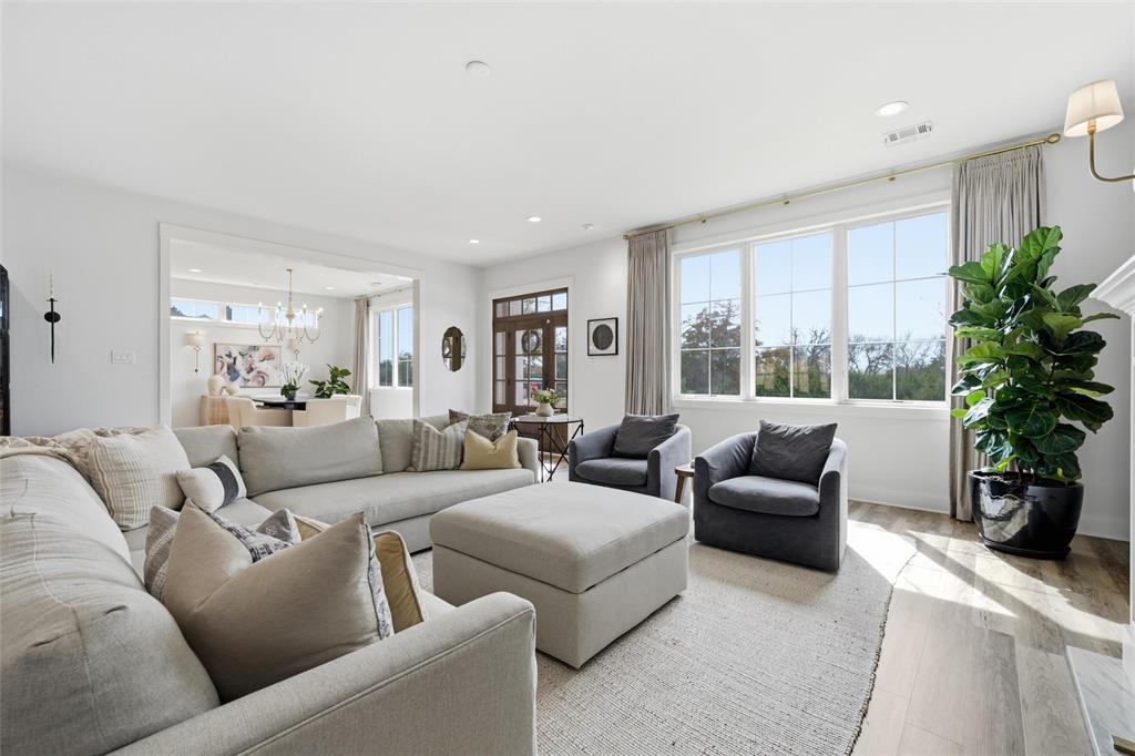 17001 Escondida Court Woodway, TX 76712 - Photo 6 of 40 a living room with furniture potted plant and a large window