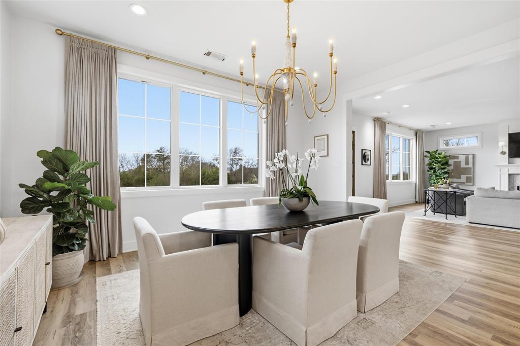 17001 Escondida Court Woodway, TX 76712 - Photo 9 of 40 a view of a dining room with furniture window and wooden floor