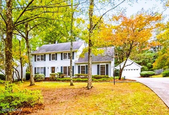1434 Craddock Way Macon, GA 31210 - Photo 1 of 32 a front view of a house with swimming pool