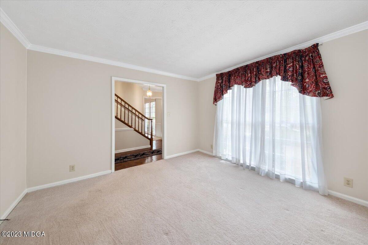 1434 Craddock Way Macon, GA 31210 - Photo 15 of 32 an empty room with windows