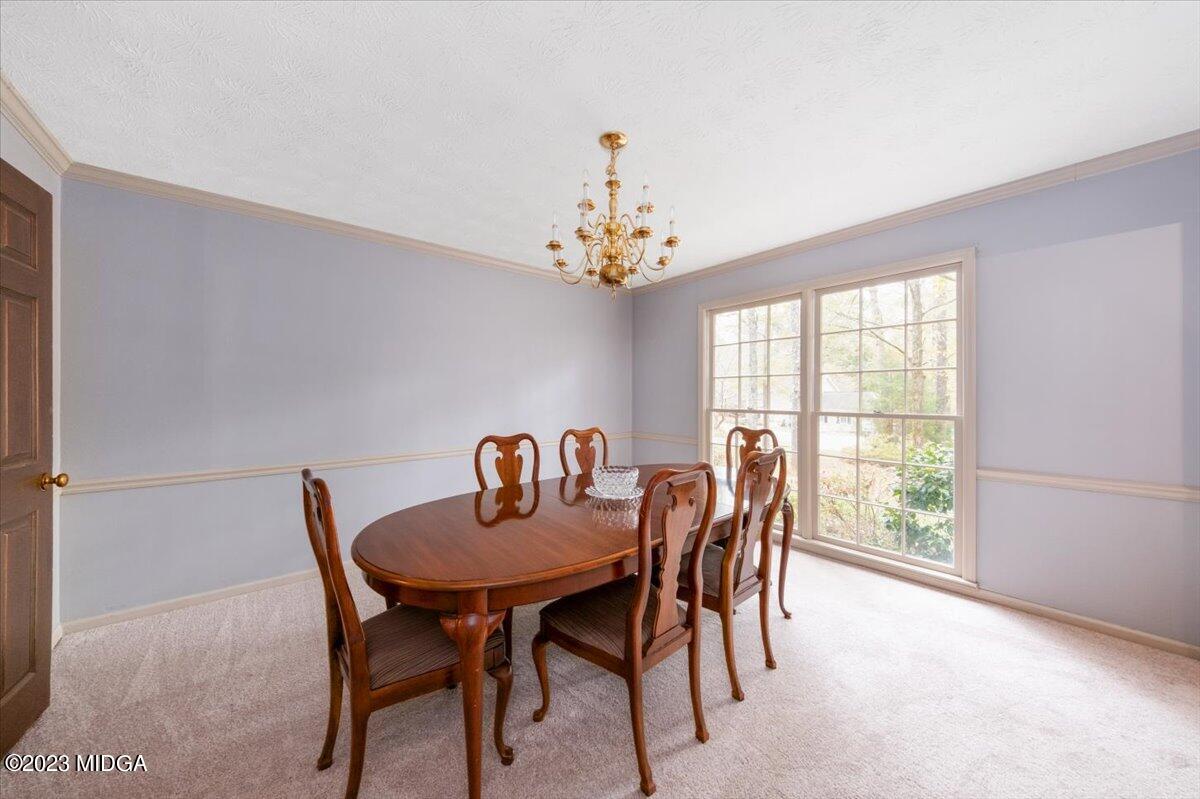 1434 Craddock Way Macon, GA 31210 - Photo 17 of 32 a dining room with furniture and window
