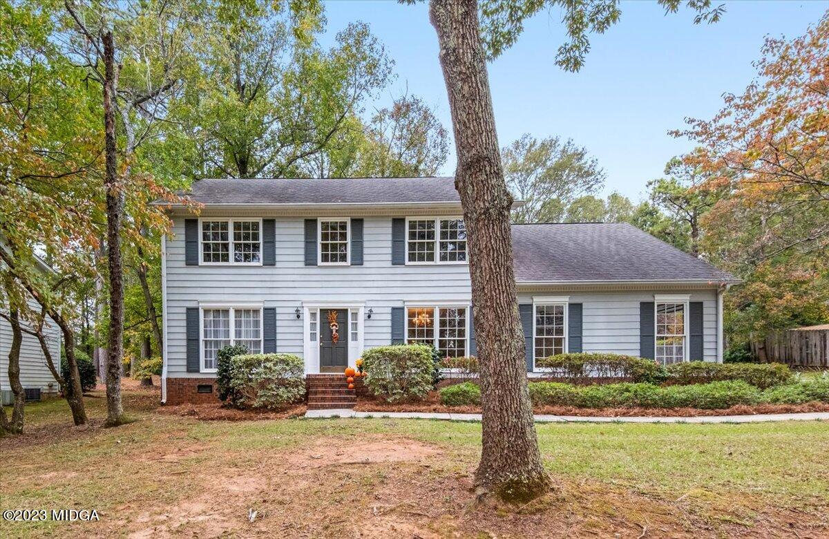 1434 Craddock Way Macon, GA 31210 - Photo 2 of 32 a front view of a house with a yard