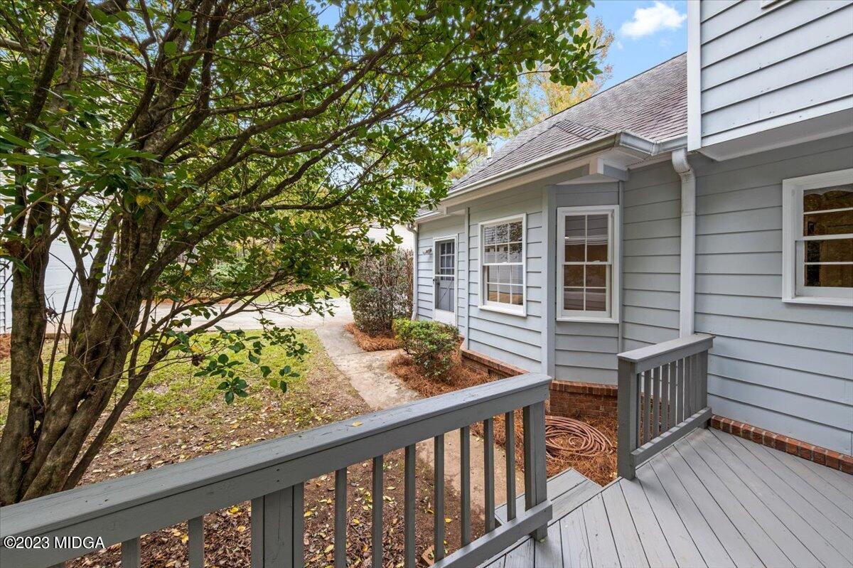 1434 Craddock Way Macon, GA 31210 - Photo 26 of 32 a view of a wooden chairs and table in the balcony