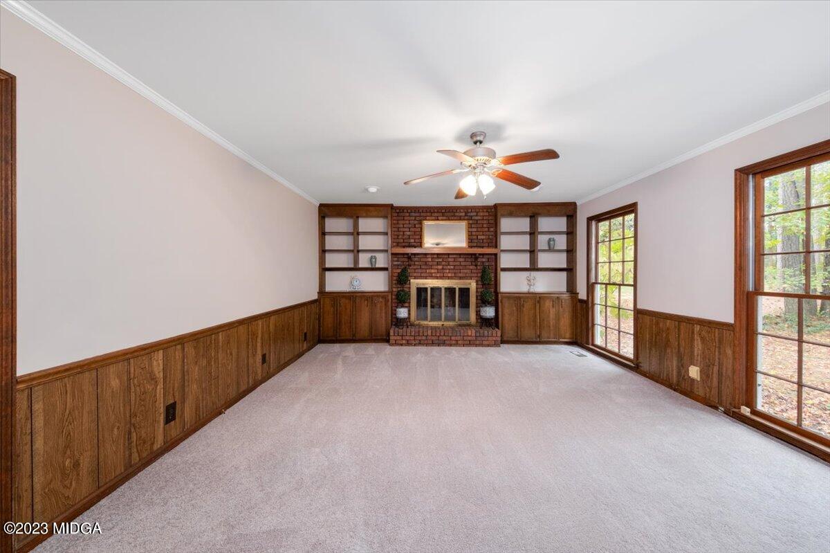 1434 Craddock Way Macon, GA 31210 - Photo 10 of 32 wooden floor in an empty room with a window