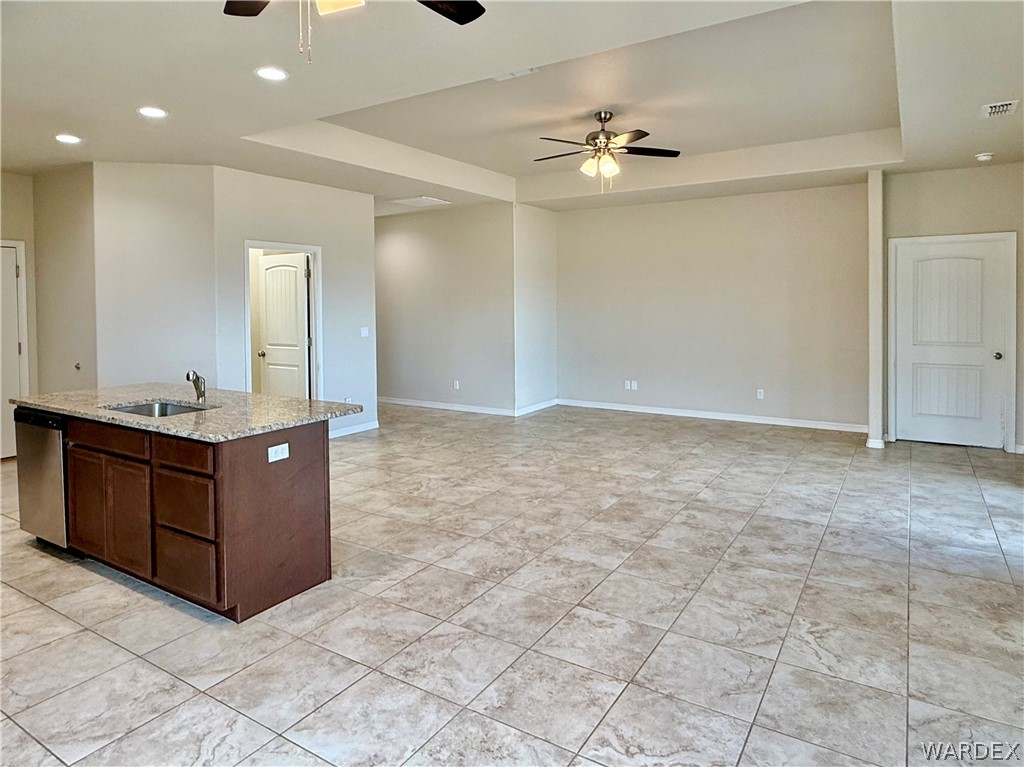 5392 Rattlesnake Road Kingman, AZ 86409 - Photo 12 of 35 a room with a cabinets and sink