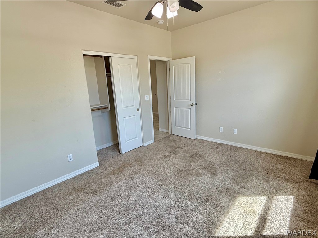 5392 Rattlesnake Road Kingman, AZ 86409 - Photo 28 of 35 wooden floor in an empty room