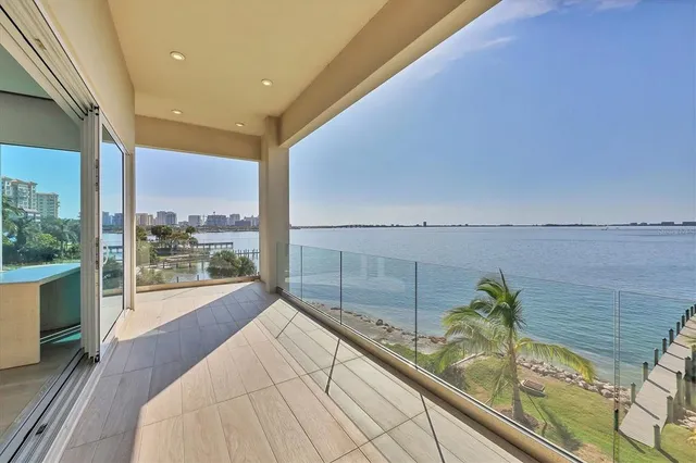 a living room with furniture and flat screen tv