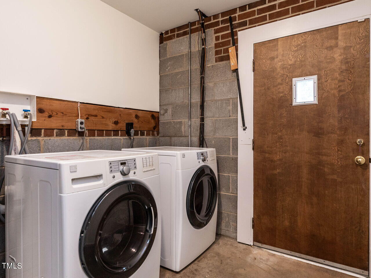 2204 Myron Drive Raleigh, NC 27607 - Photo 30 of 57 Laundry room has access to back yard and houses HVAC and water heater.