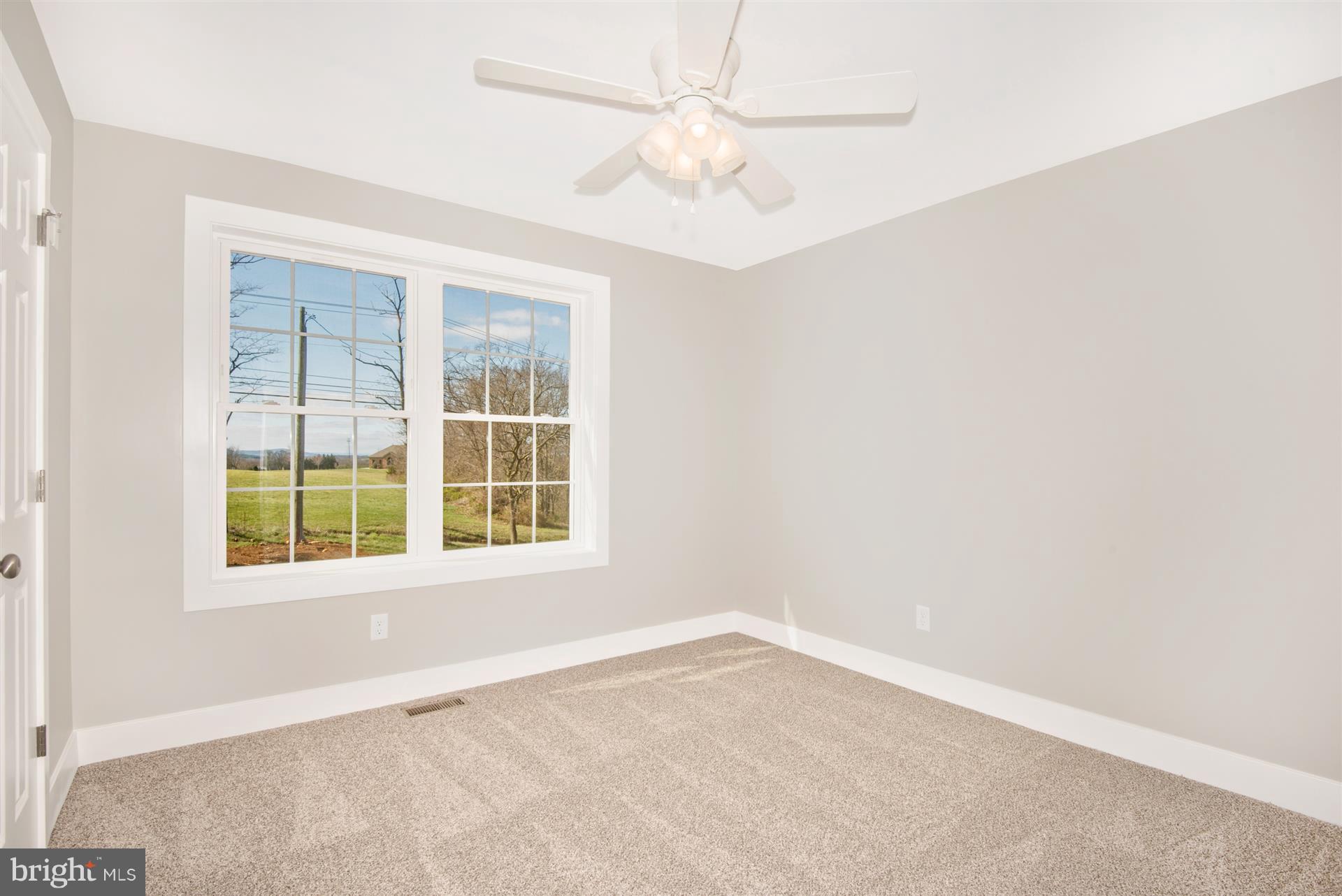 4235 Horine Road Jefferson, MD 21755 - Photo 3 of 24 an empty room with a window