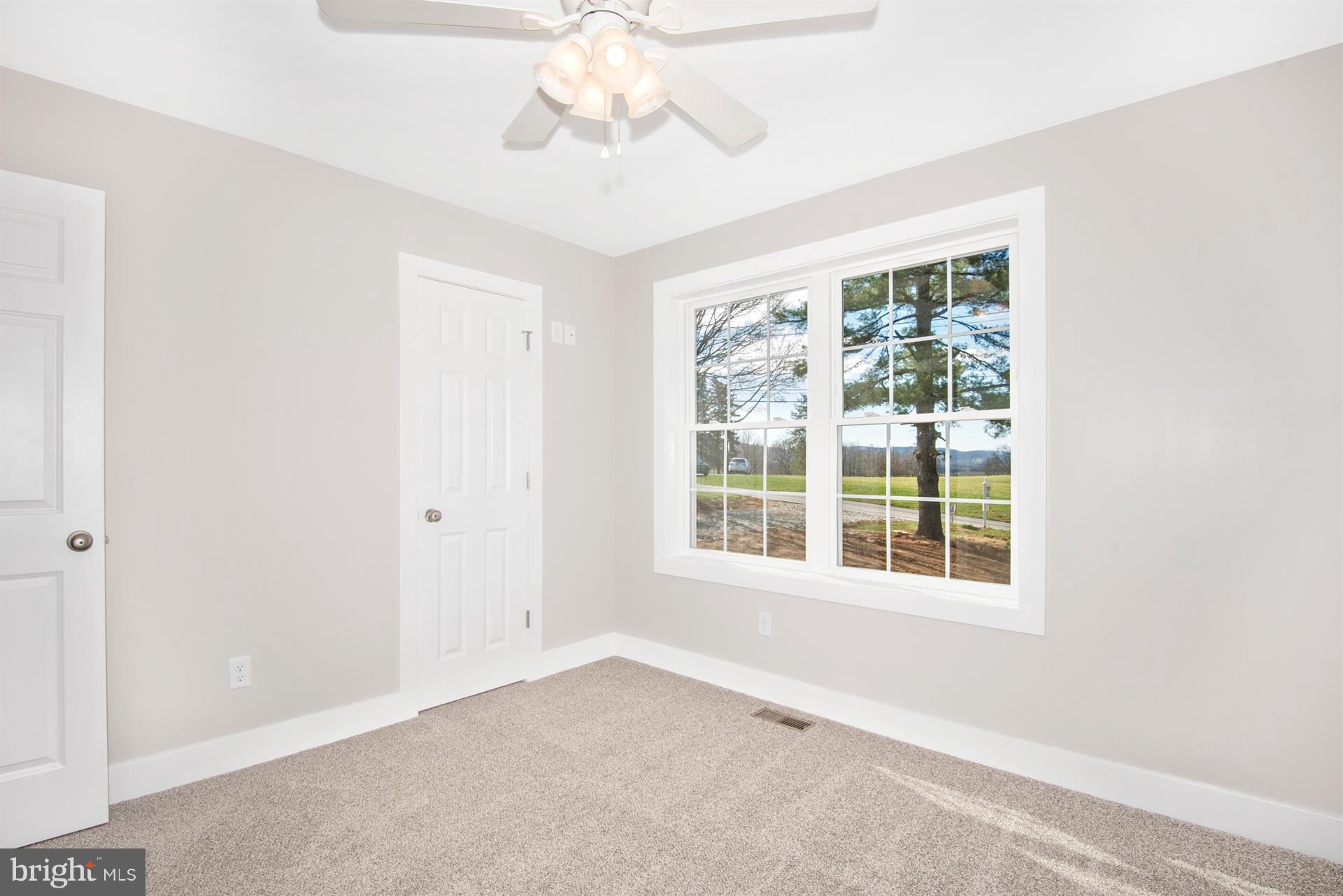 4235 Horine Road Jefferson, MD 21755 - Photo 4 of 24 an empty room with a window