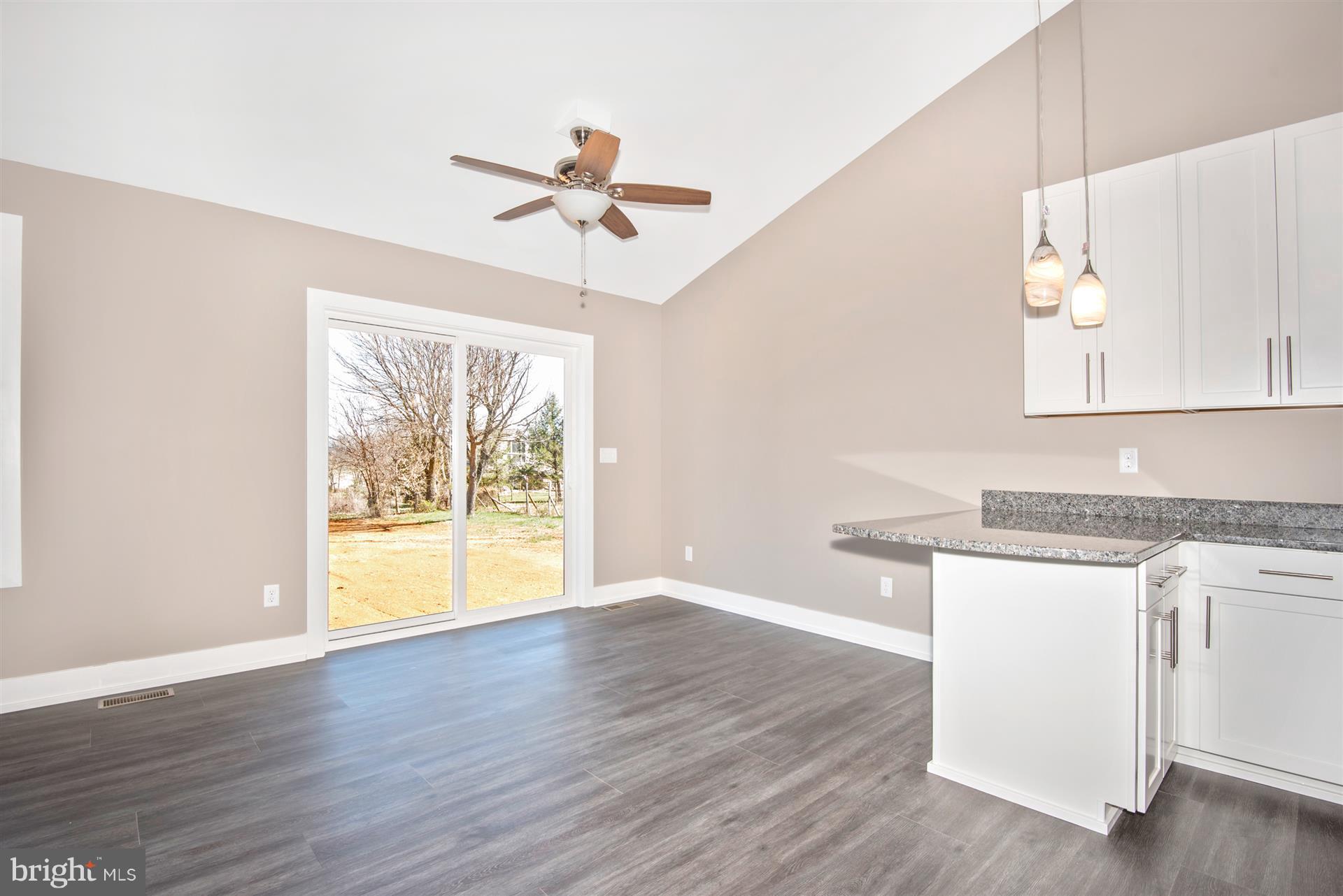 4235 Horine Road Jefferson, MD 21755 - Photo 10 of 24 a view of an empty room with wooden floor and a window