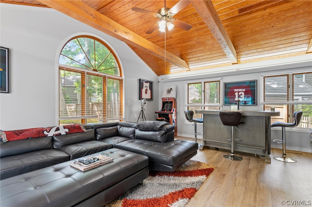 10731 Timberun Road Chesterfield, VA 23832 - Photo 12 of 25 a living room with furniture a wooden floor and a window