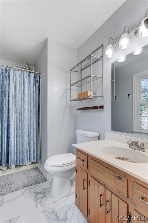 10731 Timberun Road Chesterfield, VA 23832 - Photo 19 of 25 a bathroom with a sink a toilet and a mirror