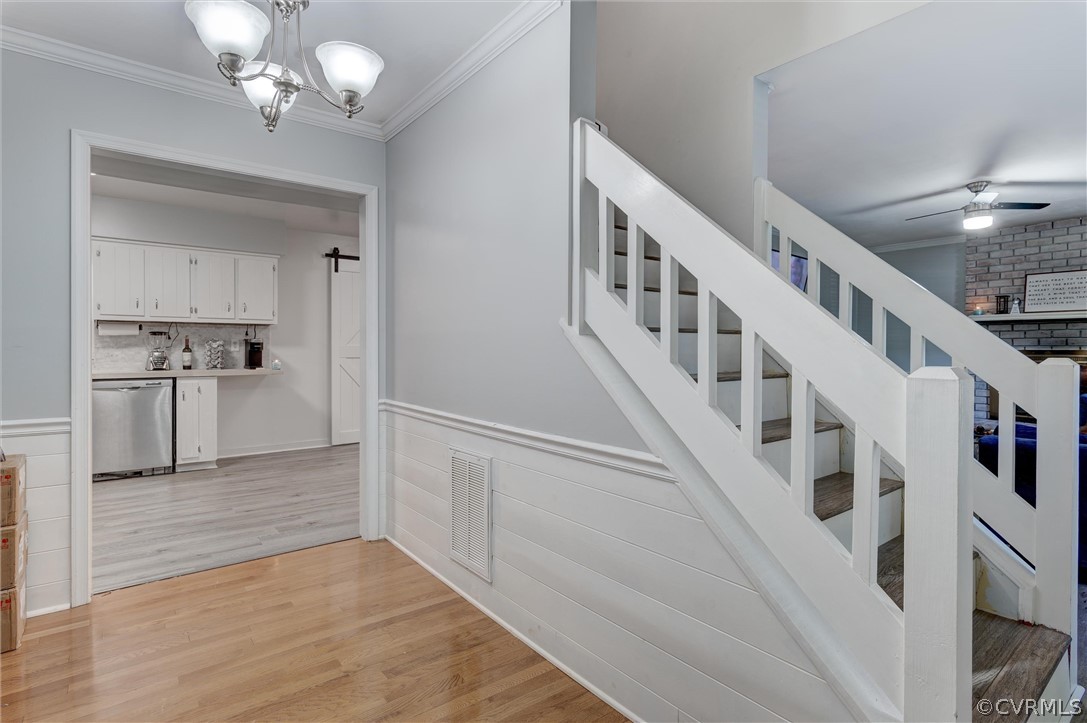 10731 Timberun Road Chesterfield, VA 23832 - Photo 3 of 25 a view of staircase and kitchen with sink