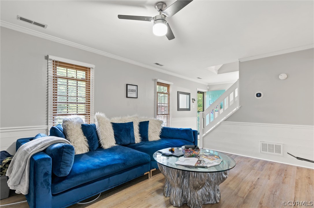 10731 Timberun Road Chesterfield, VA 23832 - Photo 6 of 25 a living room with furniture and a wooden floor